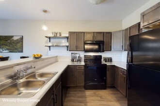 Grand Prairie Apartments & Townhomes in Sioux Falls, SD - Foto de edificio - Building Photo