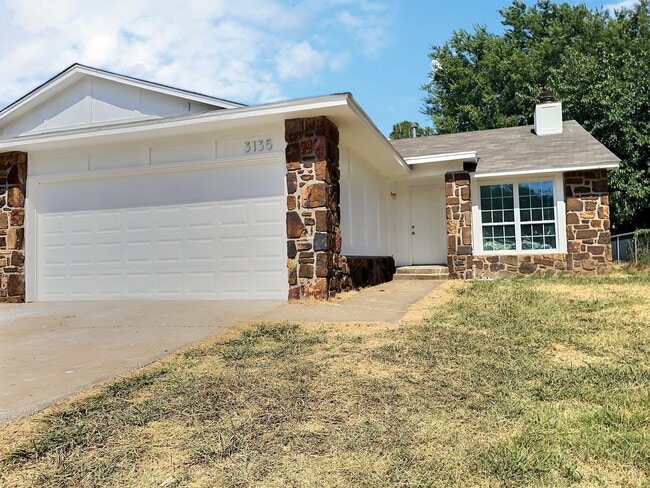 property at 3135 S 130th East Plz