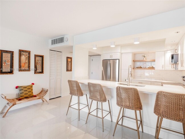property at 5701 Collins Ave