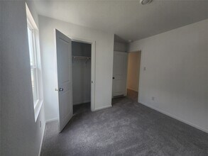 906 Pertuso Ln in Huffman, TX - Foto de edificio - Building Photo