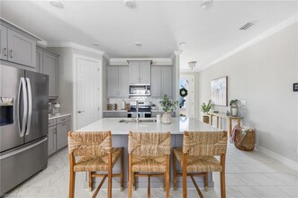 16769 Siesta Drum Wy, Unit 102-36 in Bonita Springs, FL - Building Photo - Building Photo