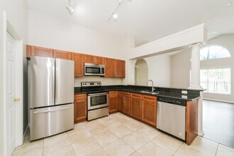 671 Eagle Pointe S, Unit 10308 Malcolm Circle Apt. H in Kissimmee, FL - Building Photo - Building Photo