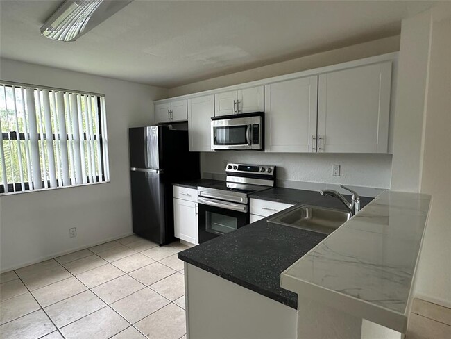 property at 10115 W Sunrise Blvd