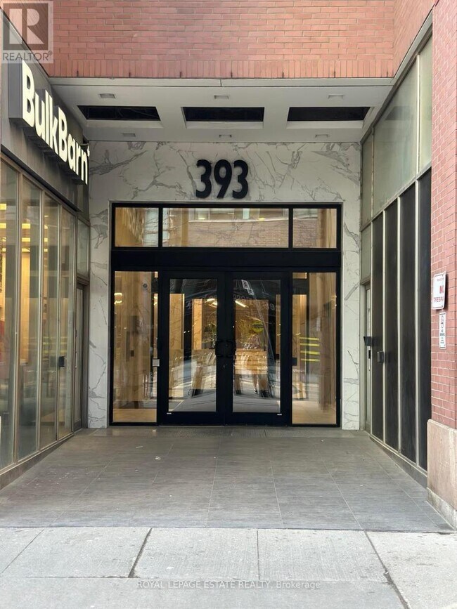 property at 393-393 King St W