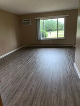 61035 11 Mile Rd, Unit 2-5 in South Lyon, MI - Building Photo - Building Photo