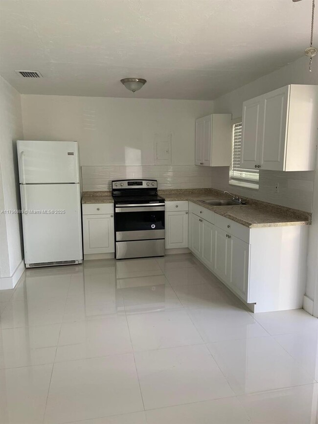 property at 320 NW 83rd St
