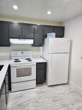 9311 Orange Grove Dr, Unit 406 in Davie, FL - Building Photo - Building Photo