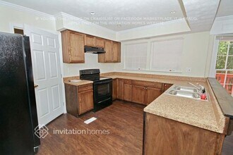 6959 Whispering Oaks Ct in Stone Mountain, GA - Building Photo - Building Photo