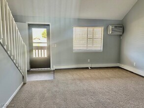 1360 Melanie Dr in Uniontown, OH - Building Photo - Building Photo