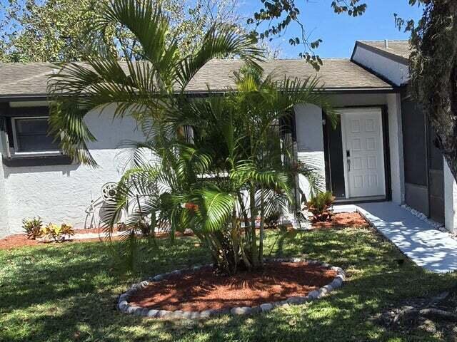 83 Conaskonk Cir in Royal Palm Beach, FL - Building Photo