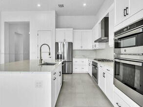 10032 Stockrun Dr in Palm Beach Gardens, FL - Building Photo - Building Photo