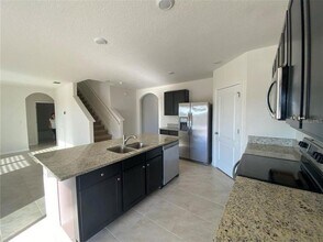 2336 White Poppy Dr in Kissimmee, FL - Building Photo - Building Photo