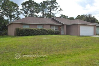 1648 Raymore St NW in Palm Bay, FL - Foto de edificio - Building Photo