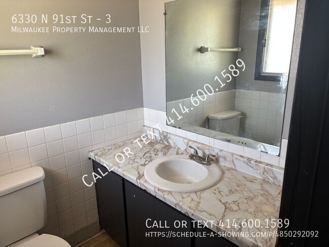 property at 6320-6330 N 91st St