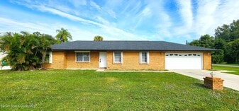 7746 Mango Grove Ave in Melbourne, FL - Building Photo