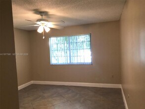 5031 Wiles Rd in Coconut Creek, FL - Building Photo - Building Photo