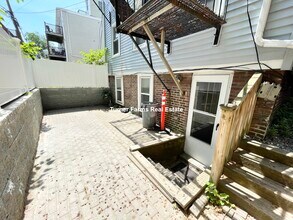 174 Bolton St, Unit 1 in Boston, MA - Foto de edificio - Building Photo