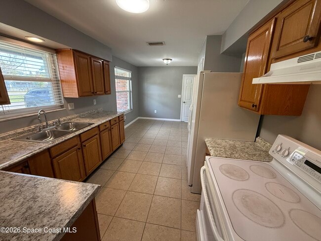 1295 Country Club Blvd in Titusville, FL - Building Photo - Building Photo