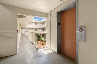 6135 NW 186th St, Unit 202 in Hialeah, FL - Building Photo - Building Photo