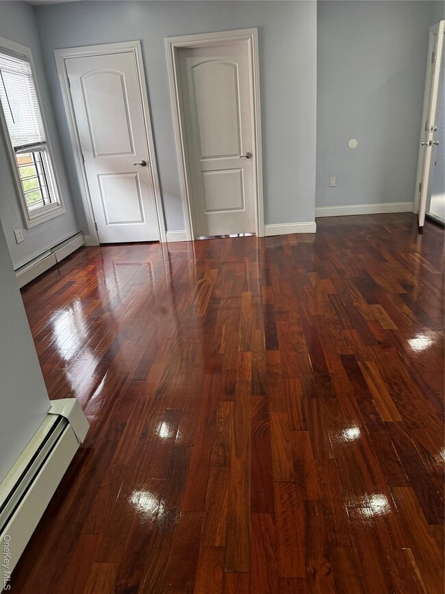 property at 818 E 216th St