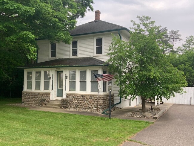 property at 57077 Grand River Ave