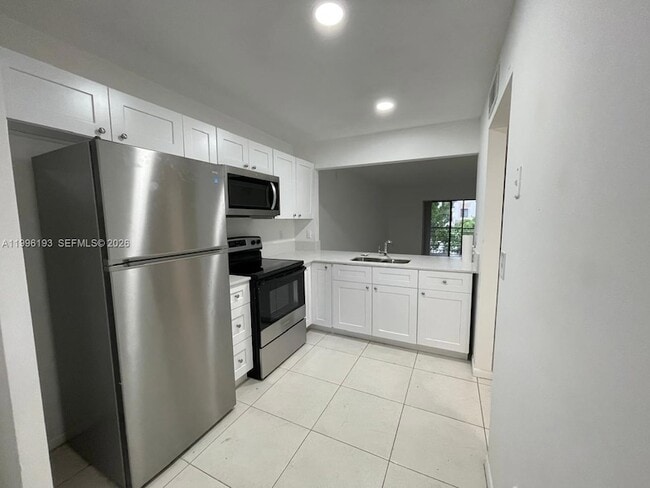 861 NE 209th Terrace, Unit 204-24 in Miami, FL - Building Photo - Building Photo