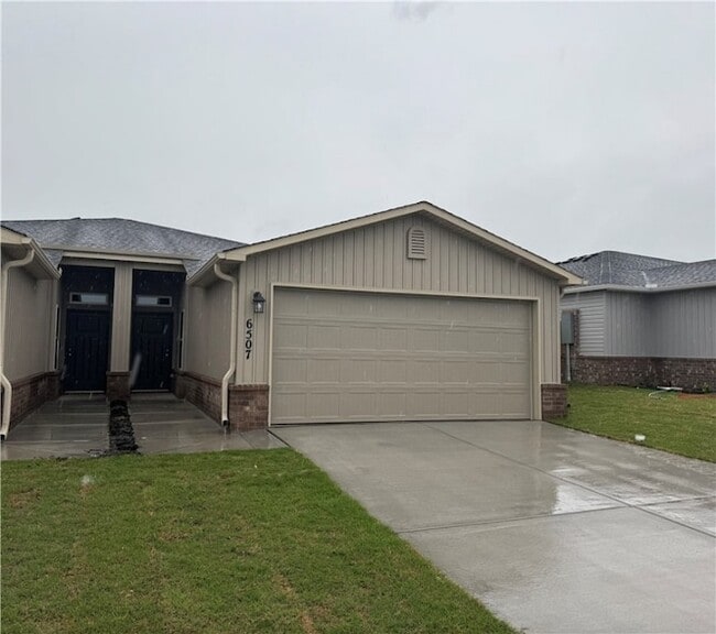 property at 6507 NW Vandergriff St