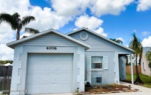 4006 Dewberry Cir in Melbourne, FL - Building Photo