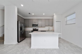 7720 Stone Crk Trl in Kissimmee, FL - Building Photo - Building Photo