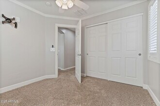 14219 W Country Gables Dr in Surprise, AZ - Building Photo - Building Photo