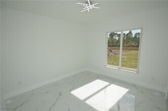 1132 Edelweiss St E in Lehigh Acres, FL - Building Photo - Building Photo