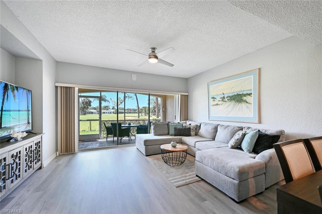 1070 Woodshire Ln-Unit -E103 in Naples, FL - Building Photo