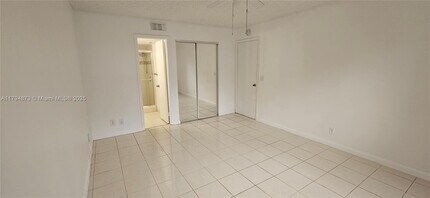 9001 Wiles Rd in Coral Springs, FL - Building Photo - Building Photo