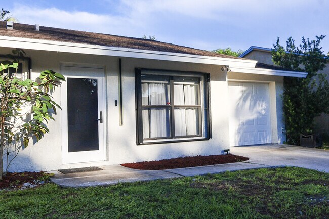 5905 Triphammer Rd in Greenacres, FL - Building Photo - Building Photo