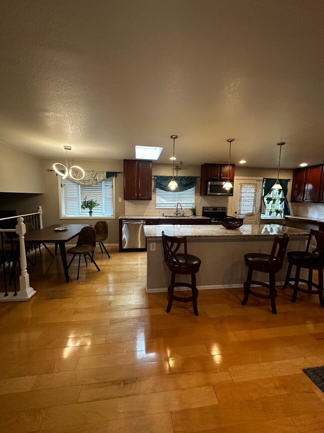 12828 W Adriatic Ave in Lakewood, CO - Building Photo - Building Photo