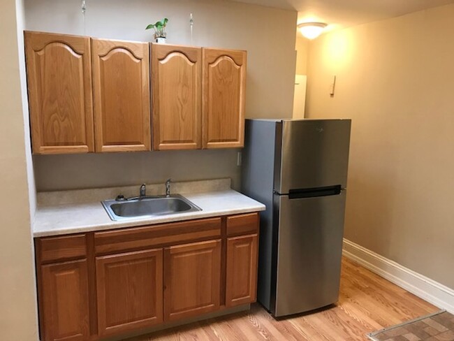 property at 53-31 Woodside Ave
