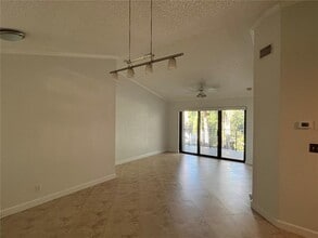 10121 W Sunrise Blvd, Unit 304 in Plantation, FL - Building Photo - Building Photo