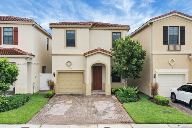 property at 673 NE 191st St