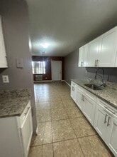 205 NW 15th St, Unit 203 in Belle Glade, FL - Foto de edificio - Building Photo