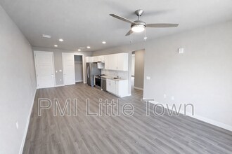 12983 W Ida Ave in Littleton, CO - Building Photo - Building Photo