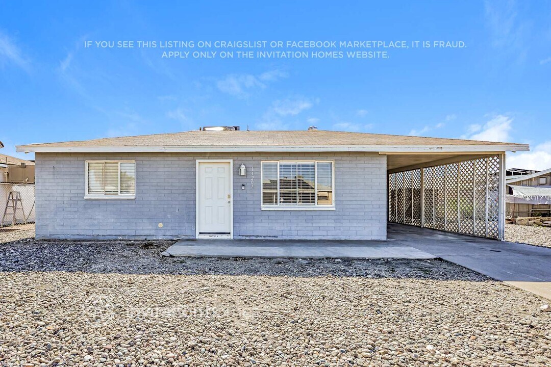 11207 W Oregon Ave in Youngtown, AZ - Building Photo