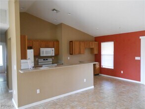 407 Chamonix Ave S in Lehigh Acres, FL - Building Photo - Building Photo