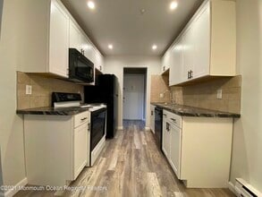 54 Amberly Dr, Unit G in Englishtown, NJ - Building Photo - Building Photo