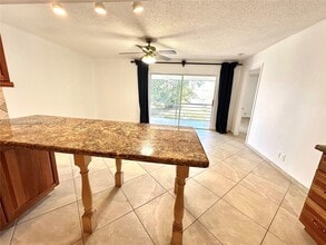 3111 Coral Springs Dr, Unit 215 in Coral Springs, FL - Building Photo - Building Photo