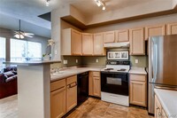 8361 S Upham Way, Unit 104 in Littleton, CO - Foto de edificio - Building Photo