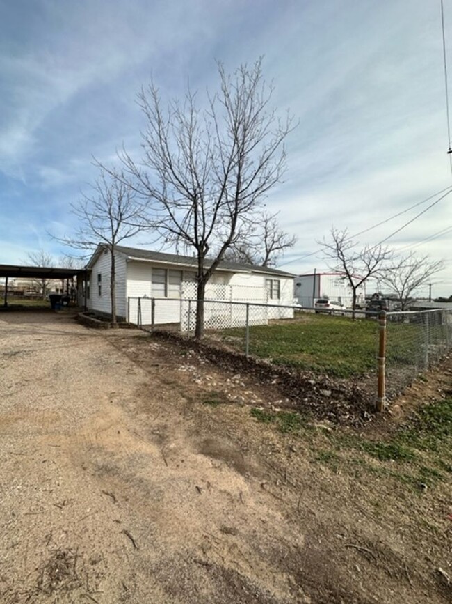 property at 233 E T&P Ln