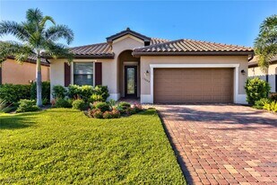 13509 San Georgio Dr in Estero, FL - Building Photo