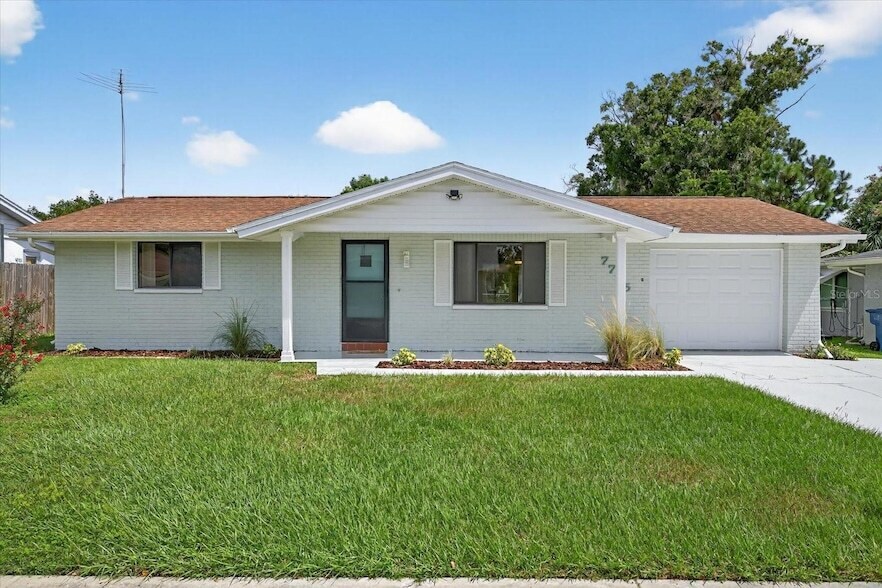 7725 Summertree Ln, Unit L402003D in New Port Richey, FL - Building Photo