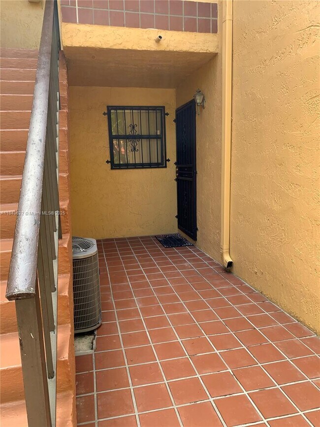 property at 10861 NW 7th St