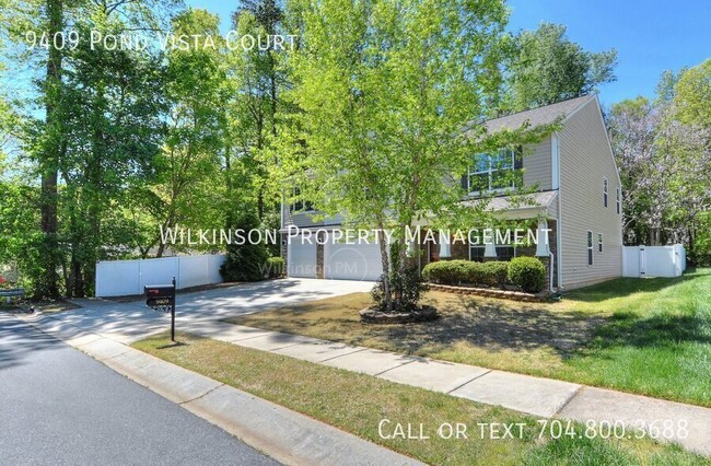 property at 9409 Pond Vista Court